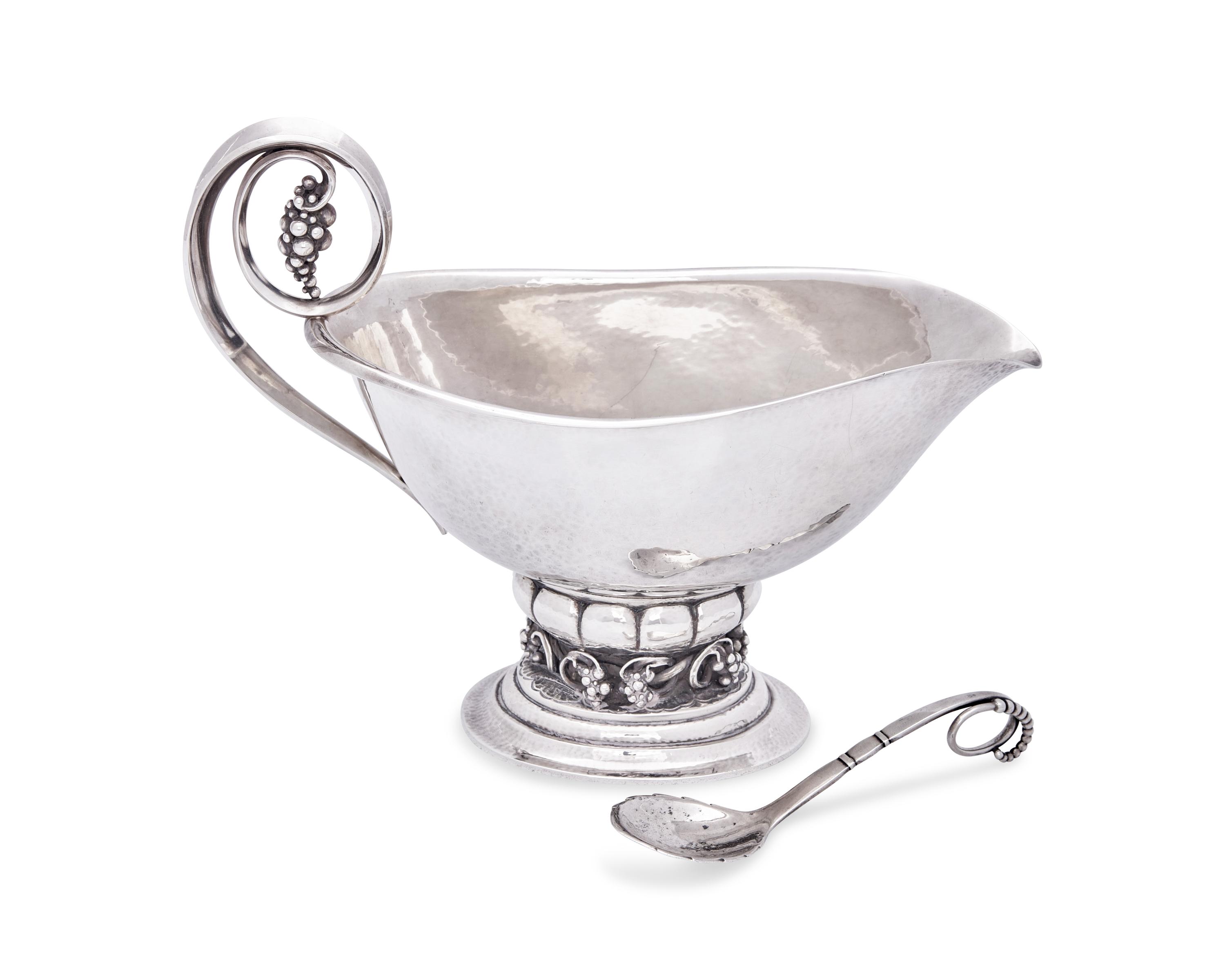 A Georg Jensen Grapevine Sauceboat with Associated Sugar Scoop