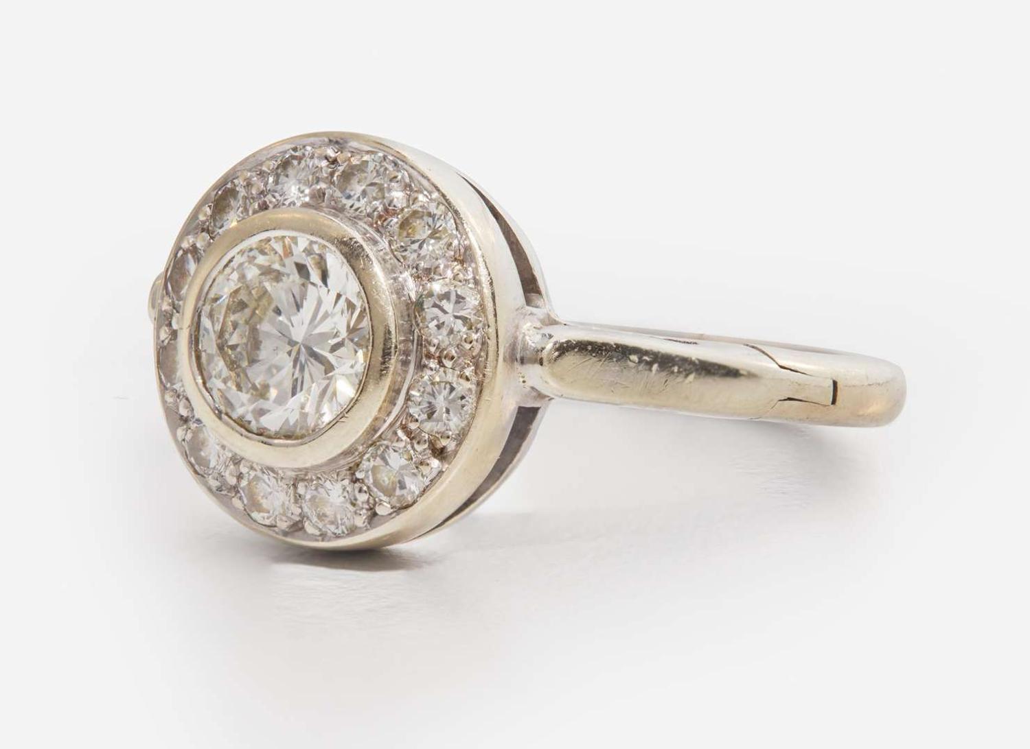 A 14K White Gold and Diamond Ring