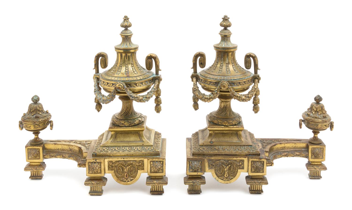 A Pair of Louis XVI Style Gilt Bronze Chenets Height 15 inches. — 19TH CENTURY