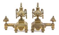 A Pair of Louis XVI Style Gilt Bronze Chenets Height 15 inches. — 19TH CENTURY