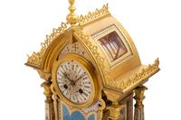 A French Gilt Bronze and Painted Porcelain Clock Garniture