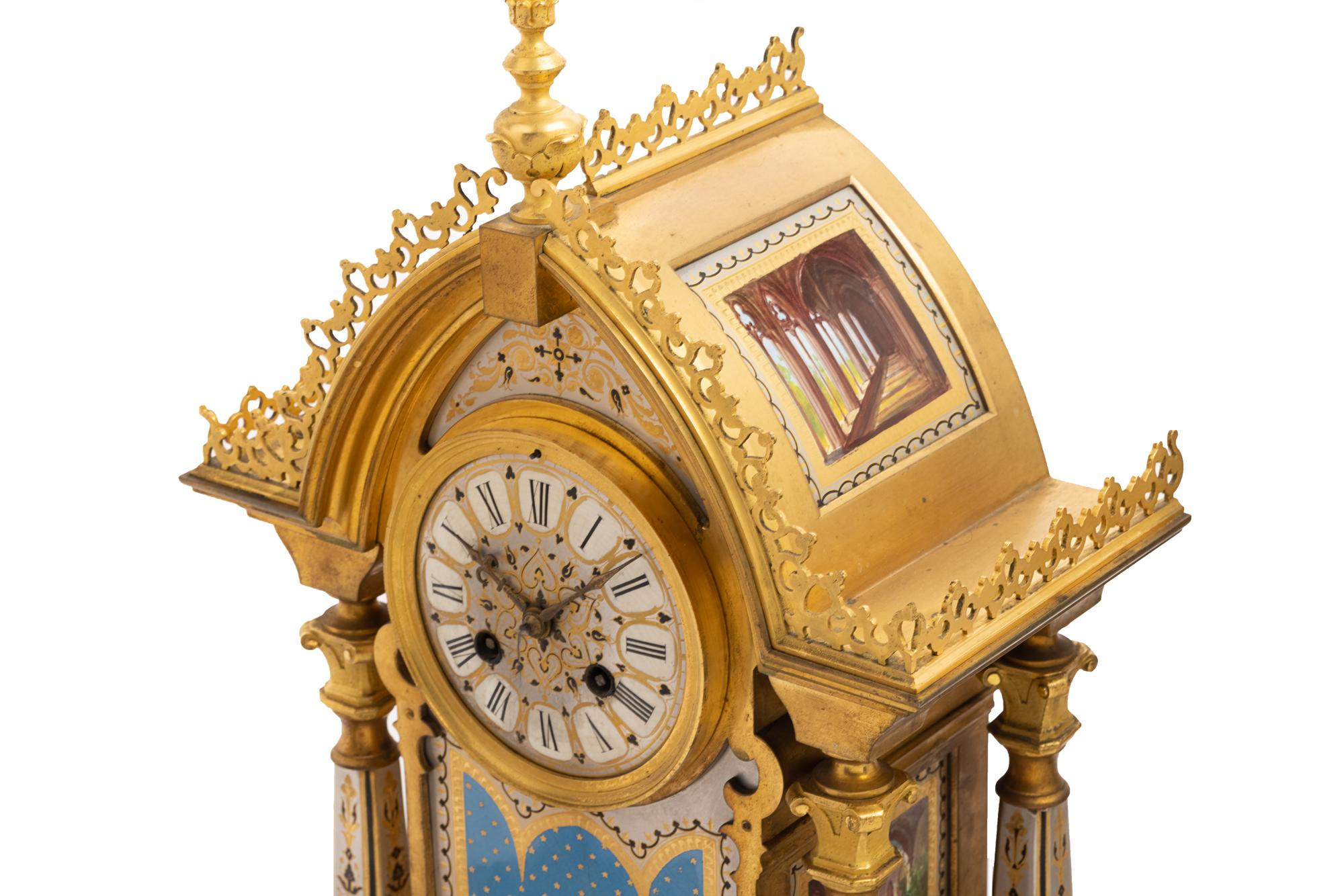 A French Gilt Bronze and Painted Porcelain Clock Garniture