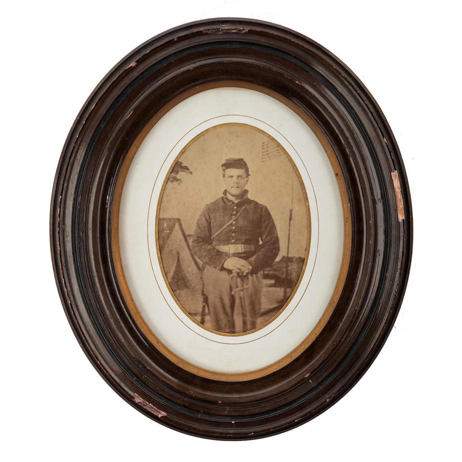 [CIVIL WAR]. Albumen photograph of Union artilleryman with sword. N.p.: n.p., [1860s].