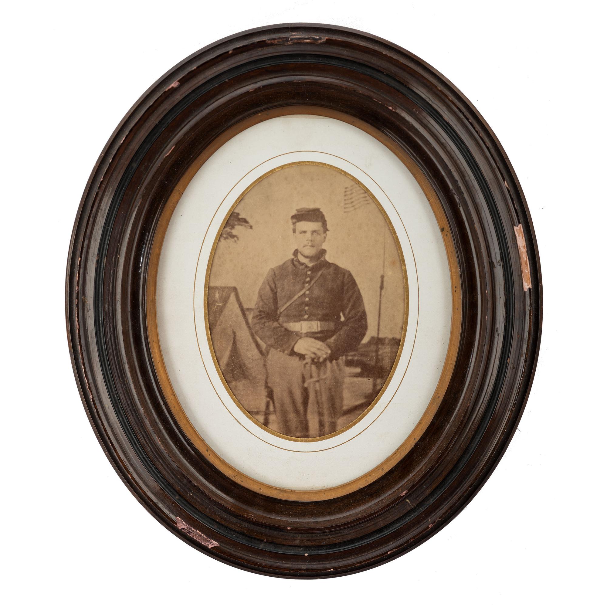 [CIVIL WAR]. Albumen photograph of Union artilleryman with sword. N.p.: n.p., [1860s].