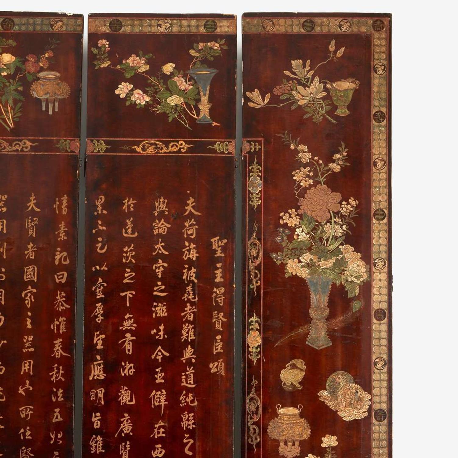 A Chinese carved twelve-panel "Coromandel" folding screen 17th/18th Century