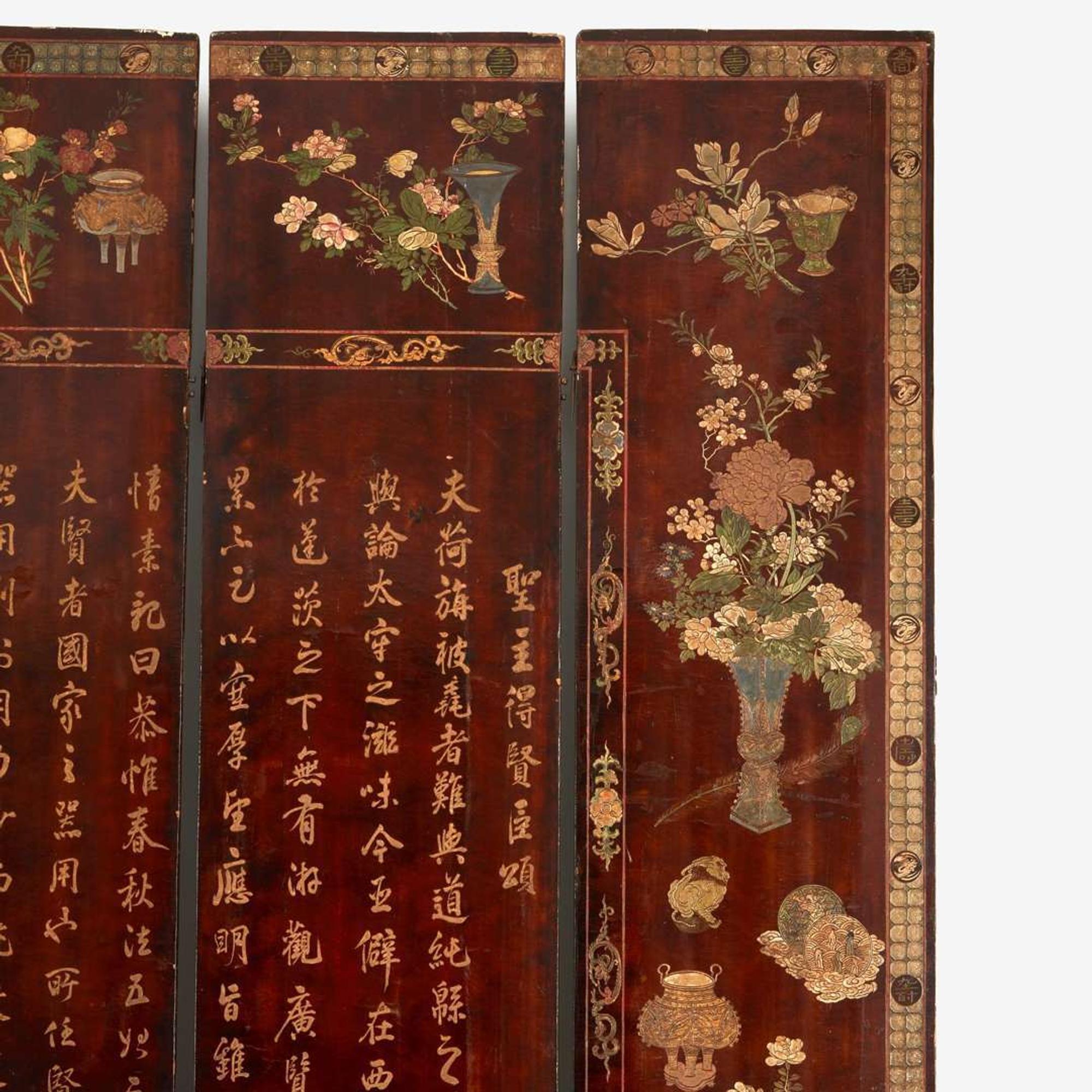 A Chinese carved twelve-panel "Coromandel" folding screen 17th/18th Century