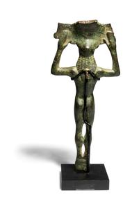 A Greek Bronze Patera Handle, in the shape of a Kouros