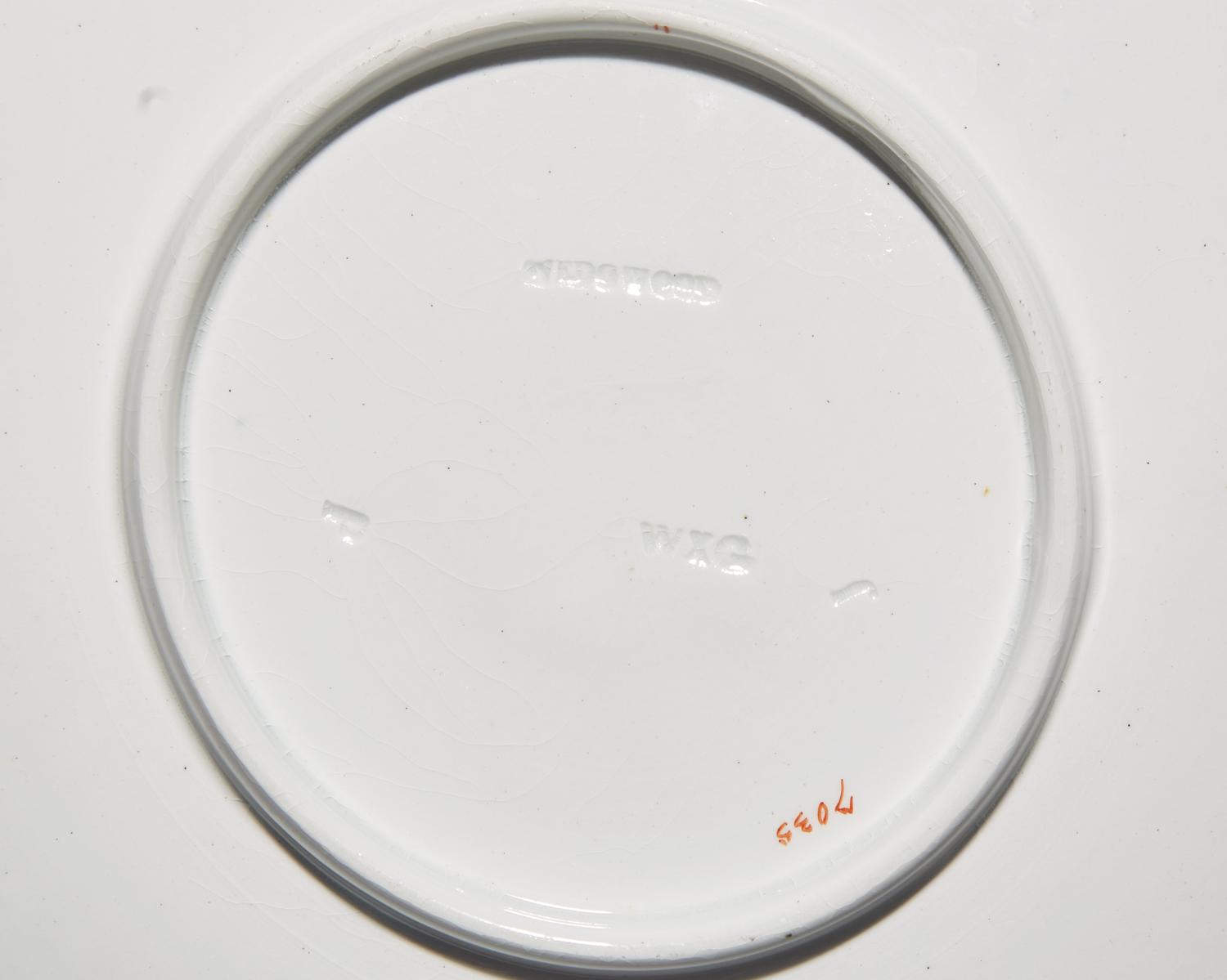 A set of ten Wedgwood pink shell-form porcelain plates, England, bearing date mark for 1877-1878