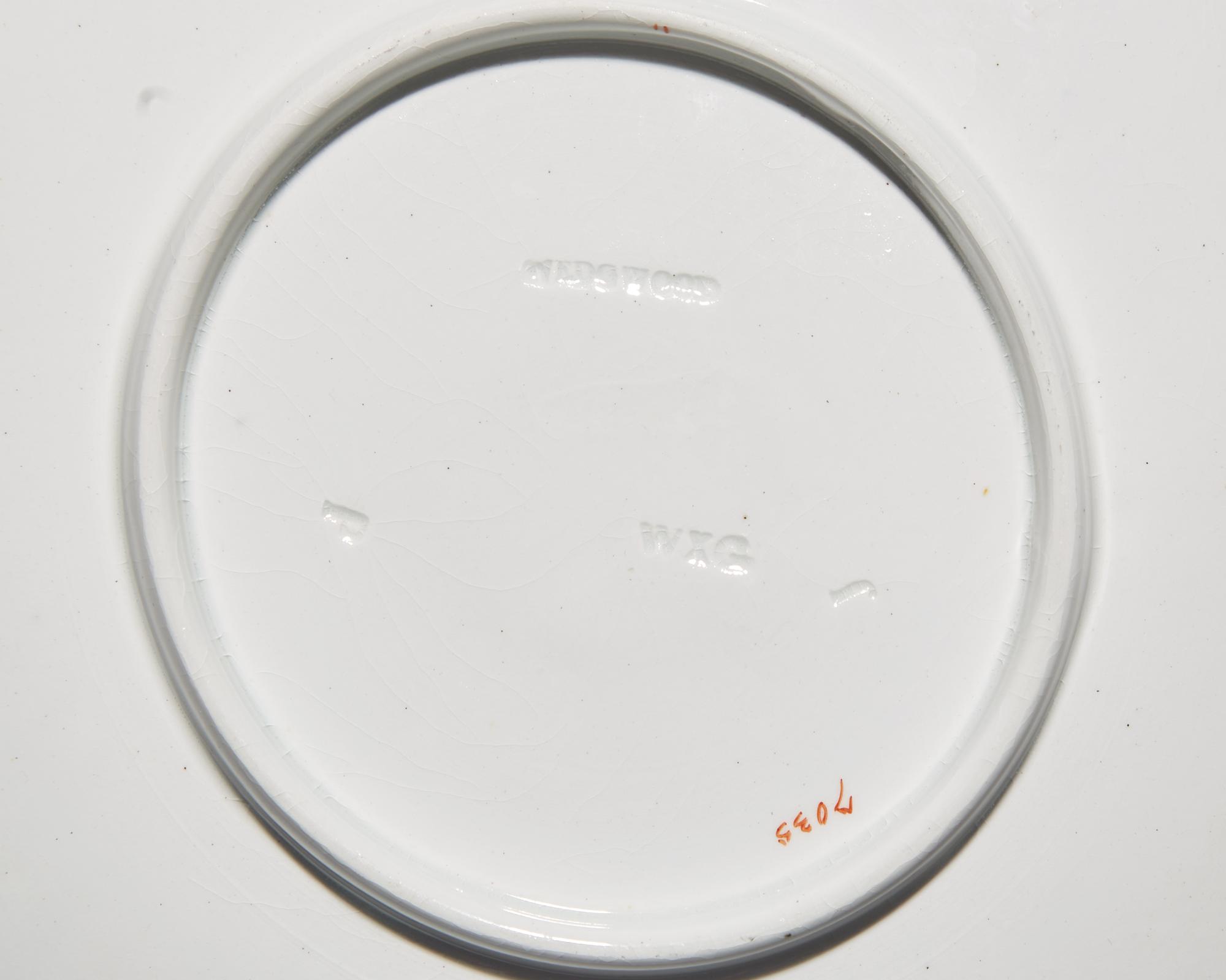A set of ten Wedgwood pink shell-form porcelain plates, England, bearing date mark for 1877-1878