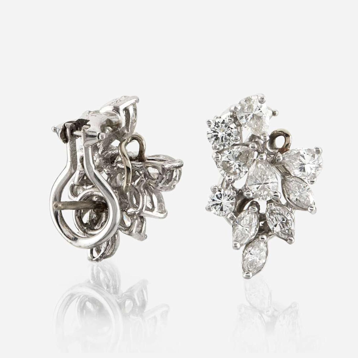 A pair of diamond and platinum earrings