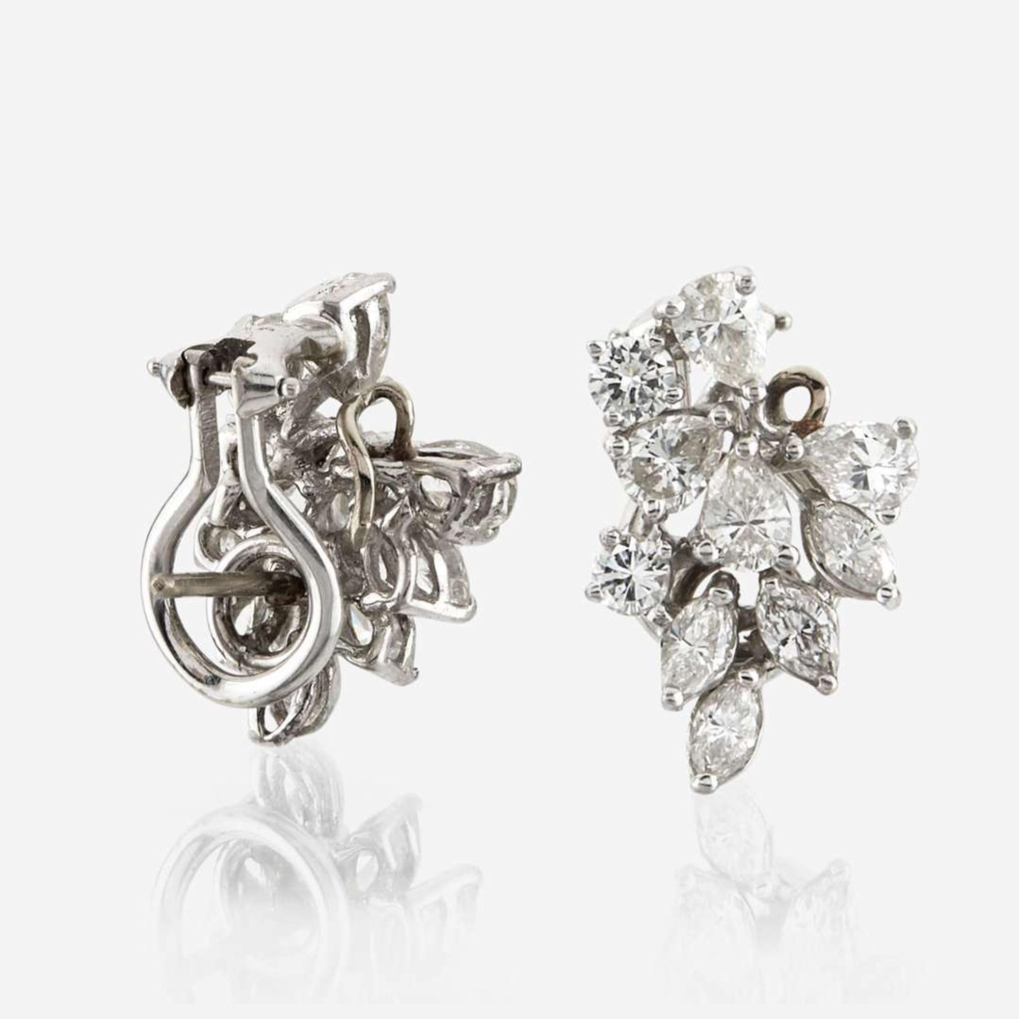 A pair of diamond and platinum earrings