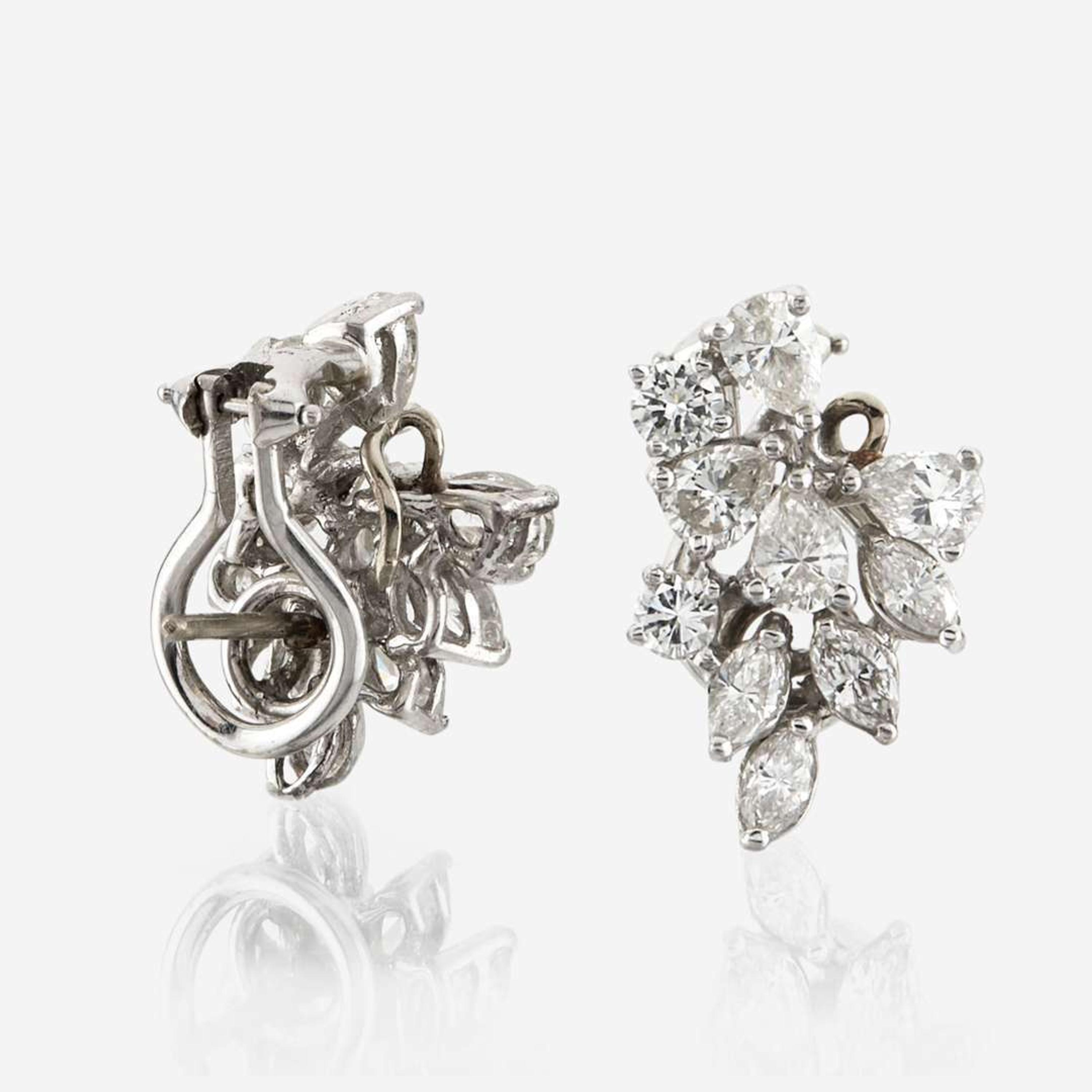 A pair of diamond and platinum earrings