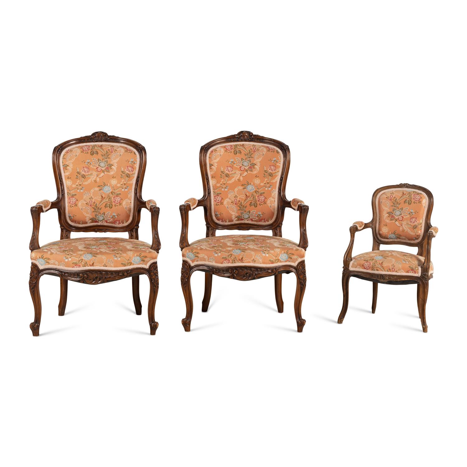 A Set of Three Louis XV Style Walnut Fauteuils