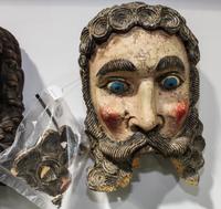 A Central American Carved Wood Mask Height of first 12 inches.