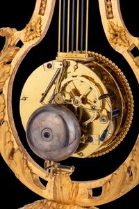 A French Gilt Bronze and Marble Lyre-Form Clock, Bourdier