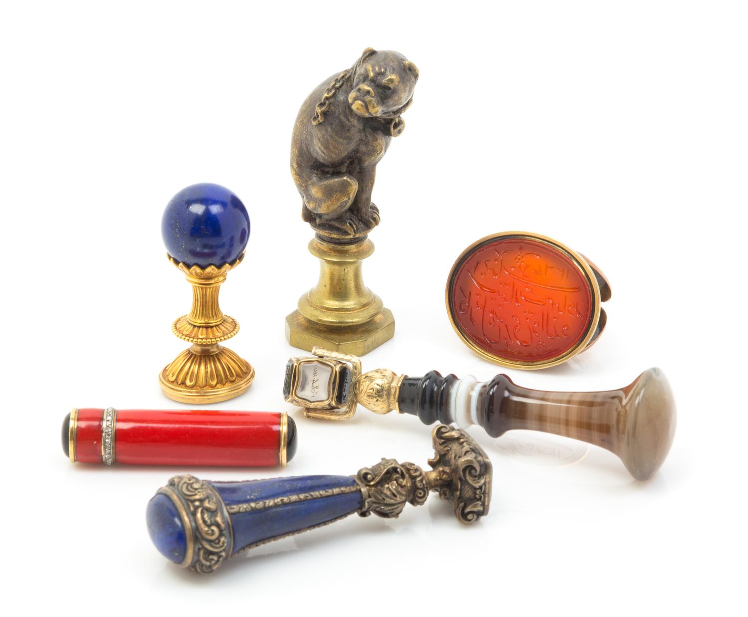 A Group of Five Continental Hardstone and Bronze Mounted Seals Height of first 3 inches.