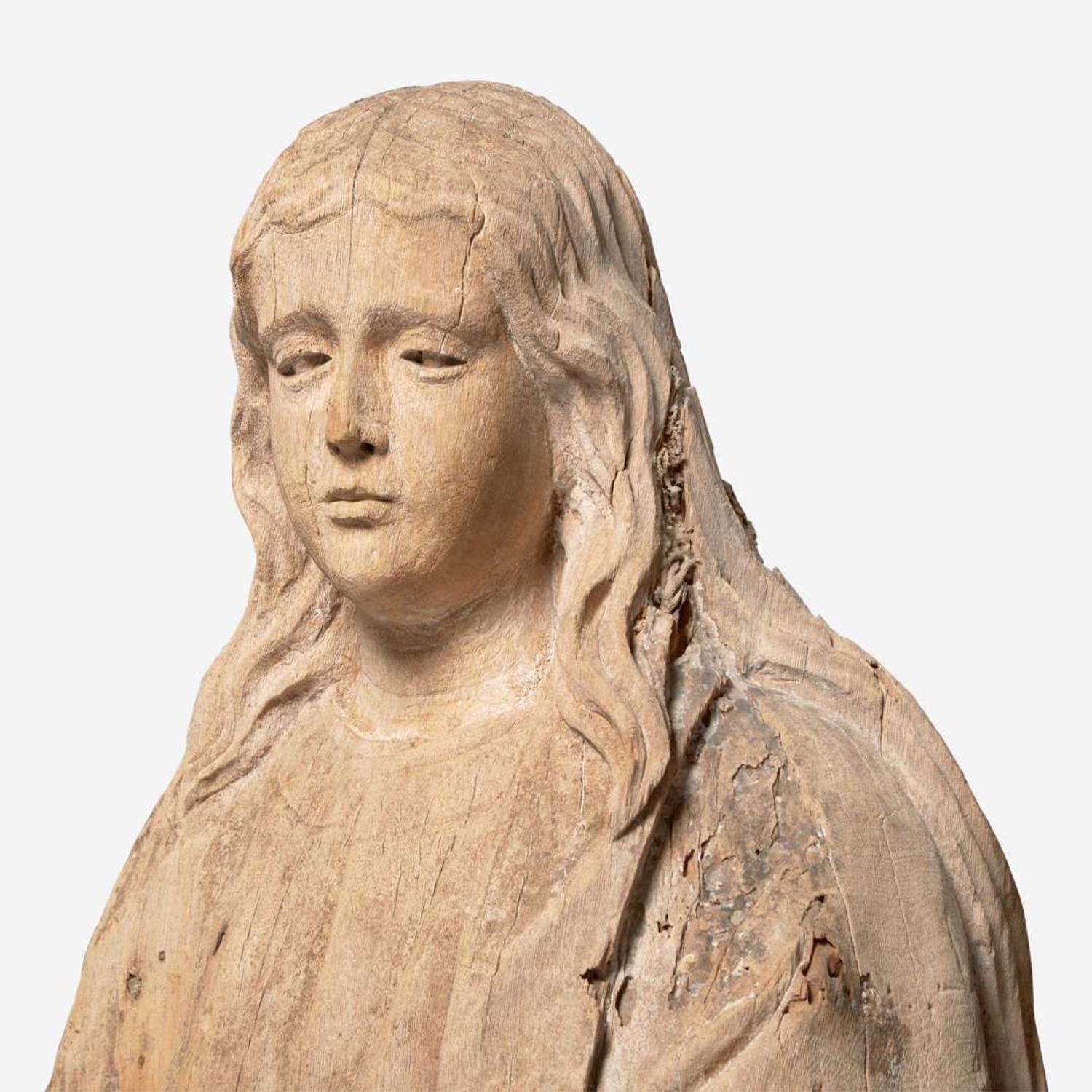 A carved wood figure of a saint Continental, 16th / 17th century