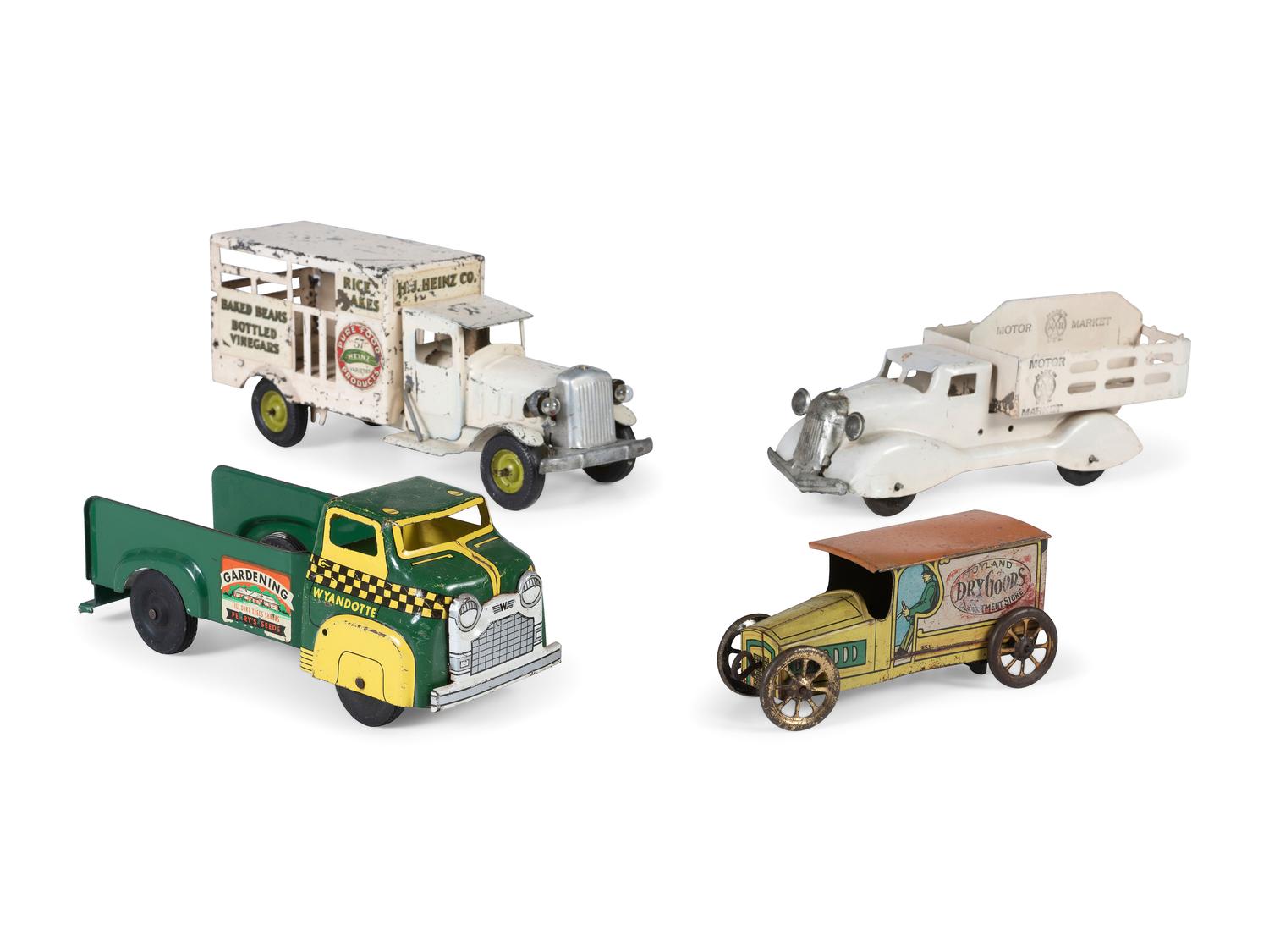 Four Pressed Steel and Tin Lithograph Delivery Trucks