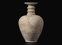 An unusual carved whiteware bottle vase, possibly Qingbai or Yueyao 白陶瓶 可能為青白或越窯