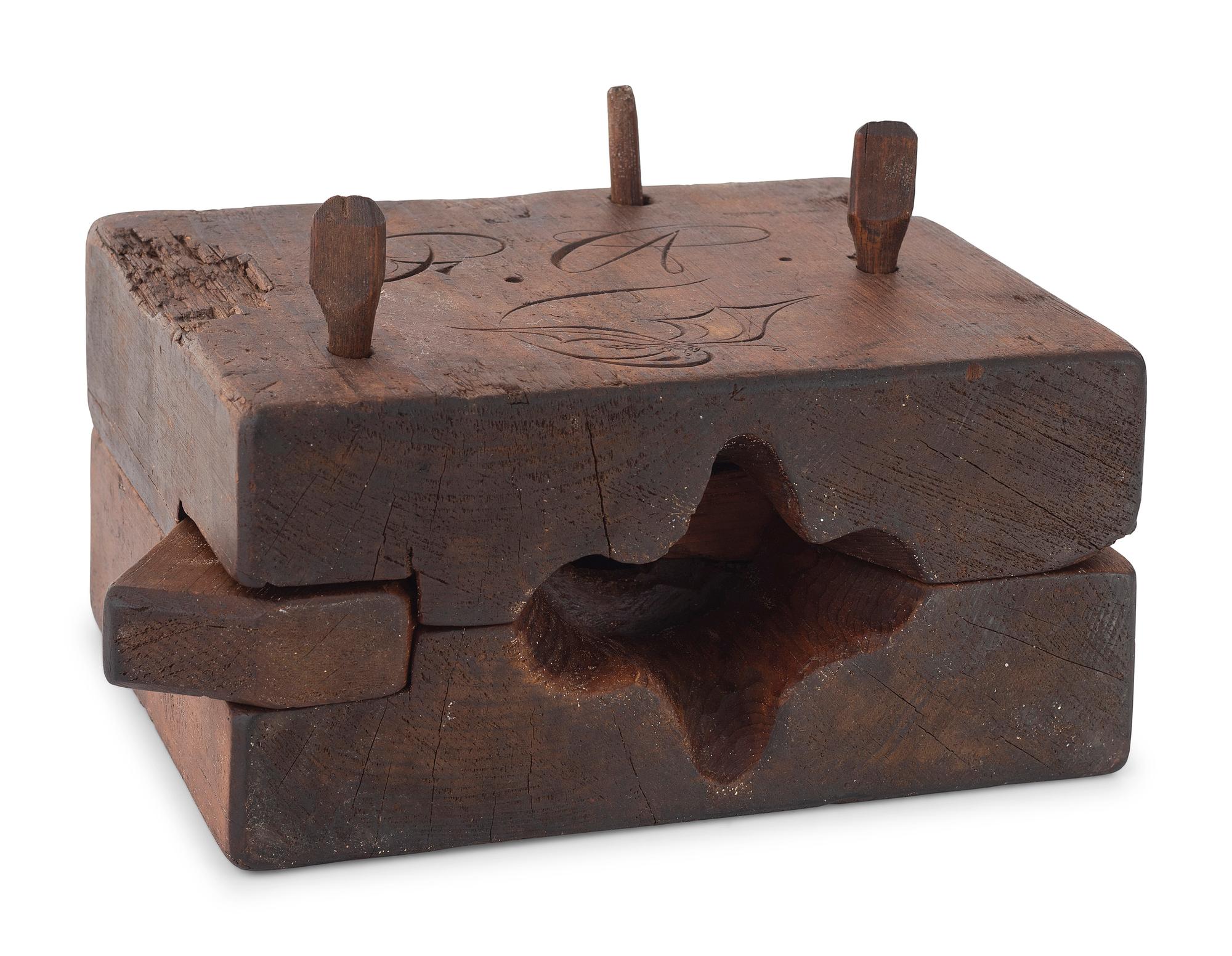 A Two-Part Carved Pine Squirrel Form Butter Mold