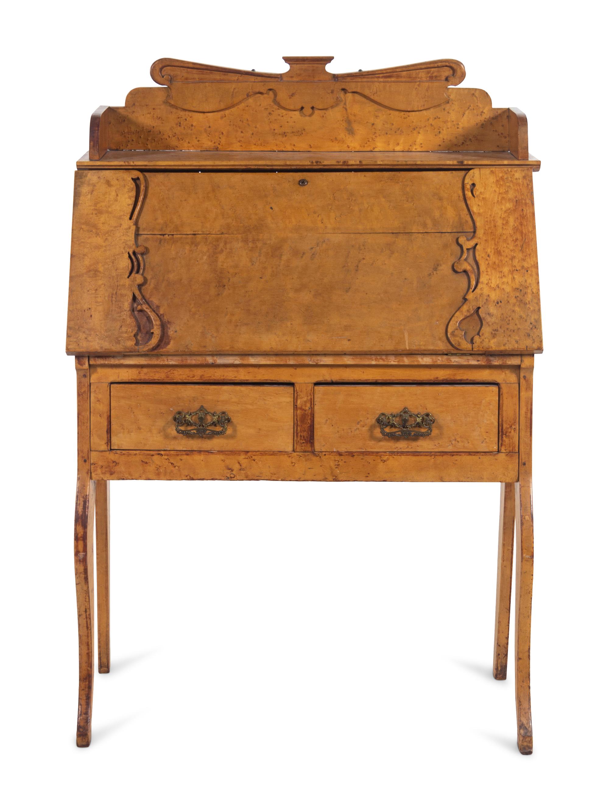 An Austrian Birdseye Maple Slant-Front Desk
