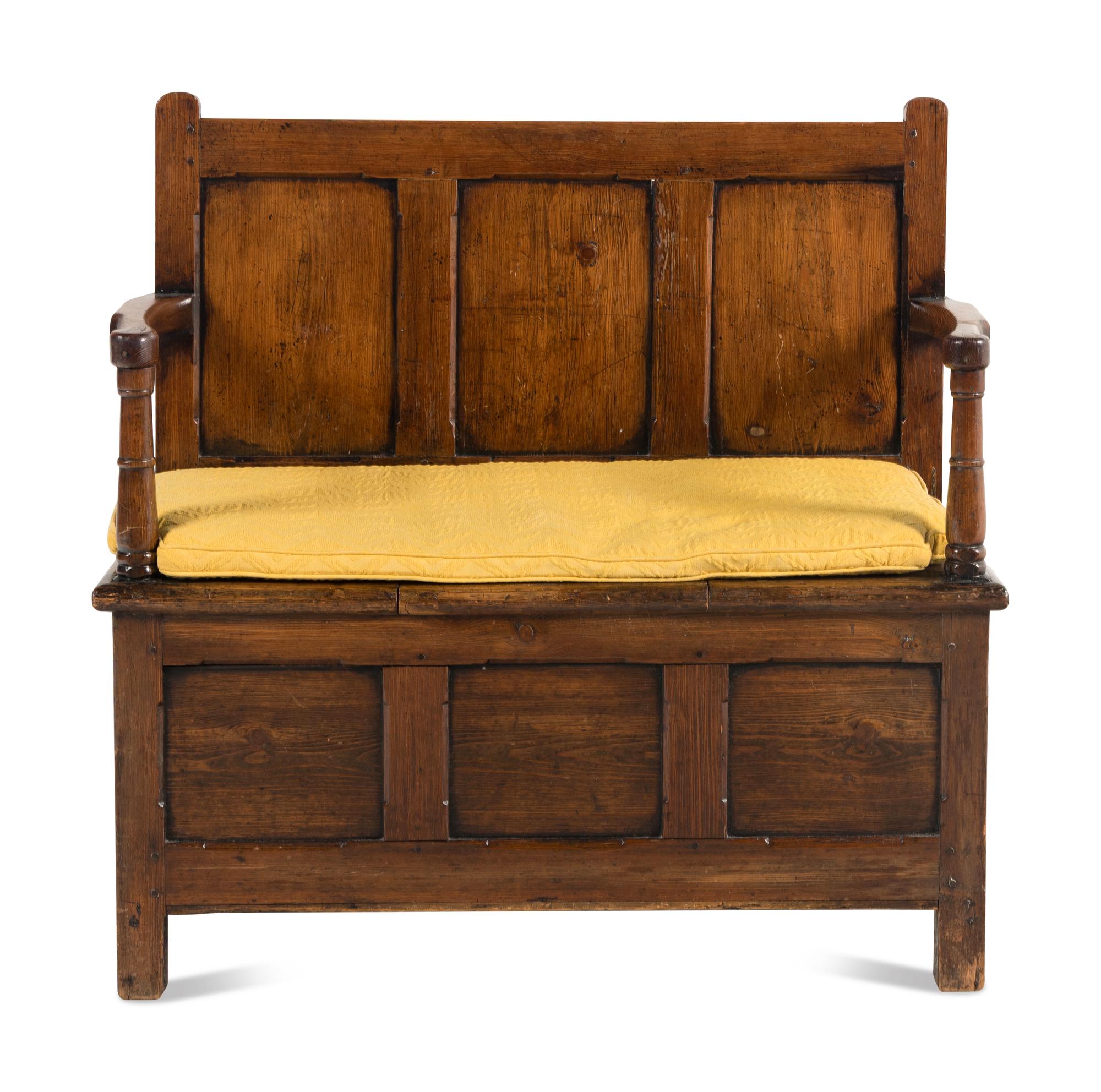 An English Carved Oak Settle