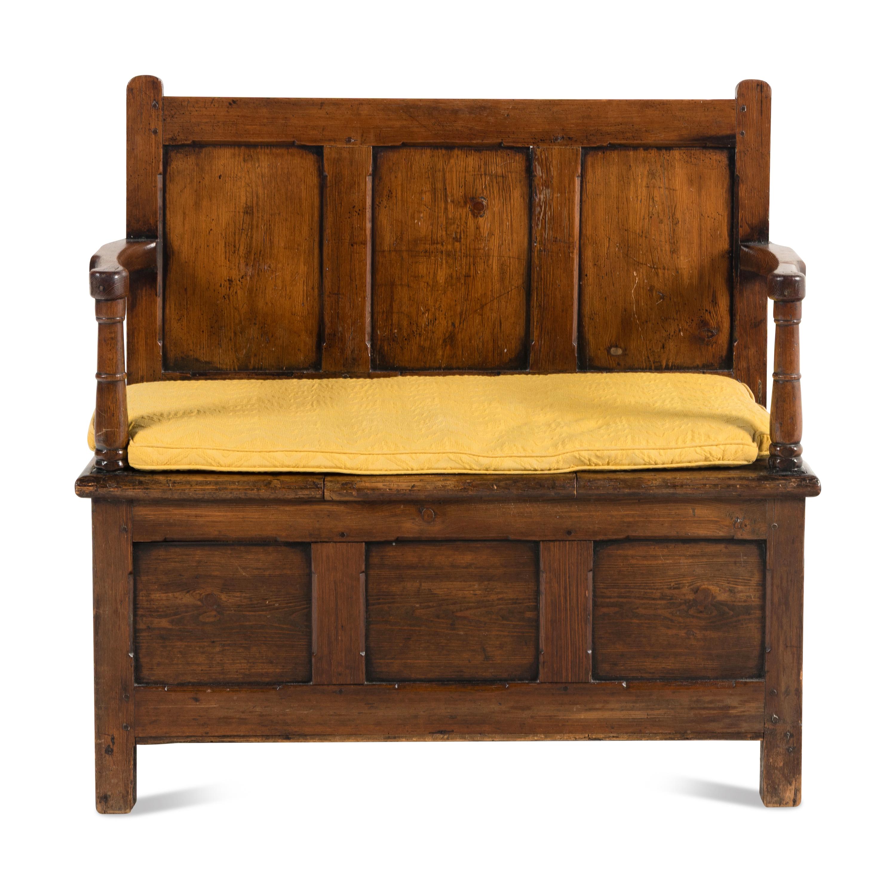 An English Carved Oak Settle
