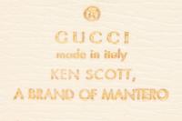 GUCCI, THREE PRINTED WALLETS