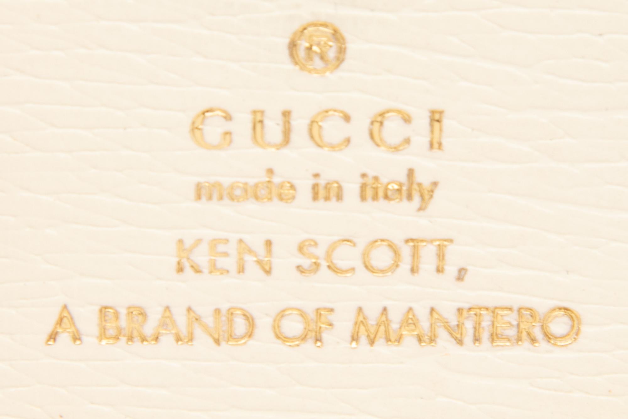 GUCCI, THREE PRINTED WALLETS