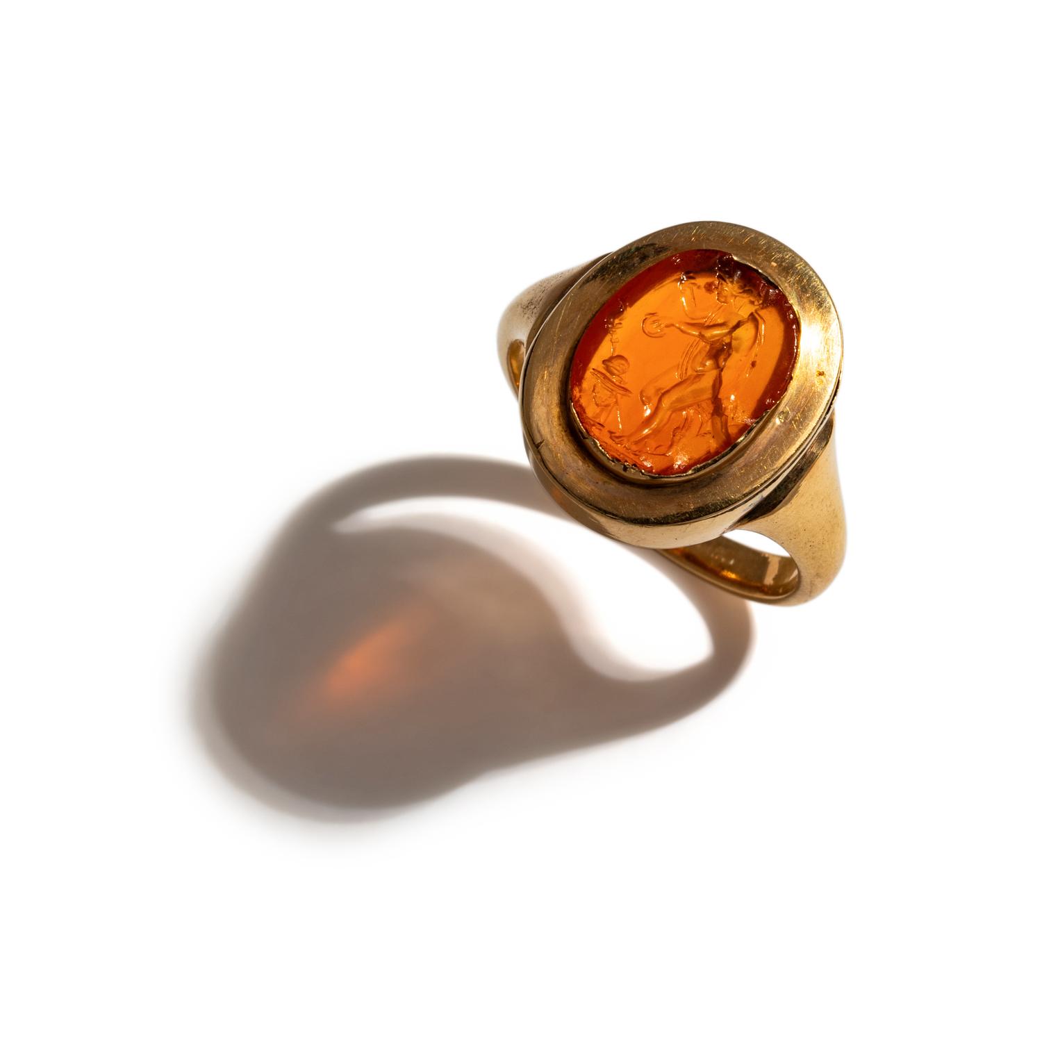 A Neoclassical Gold and Carnelian Finger Ring with the Goddess Ceres at an Alter