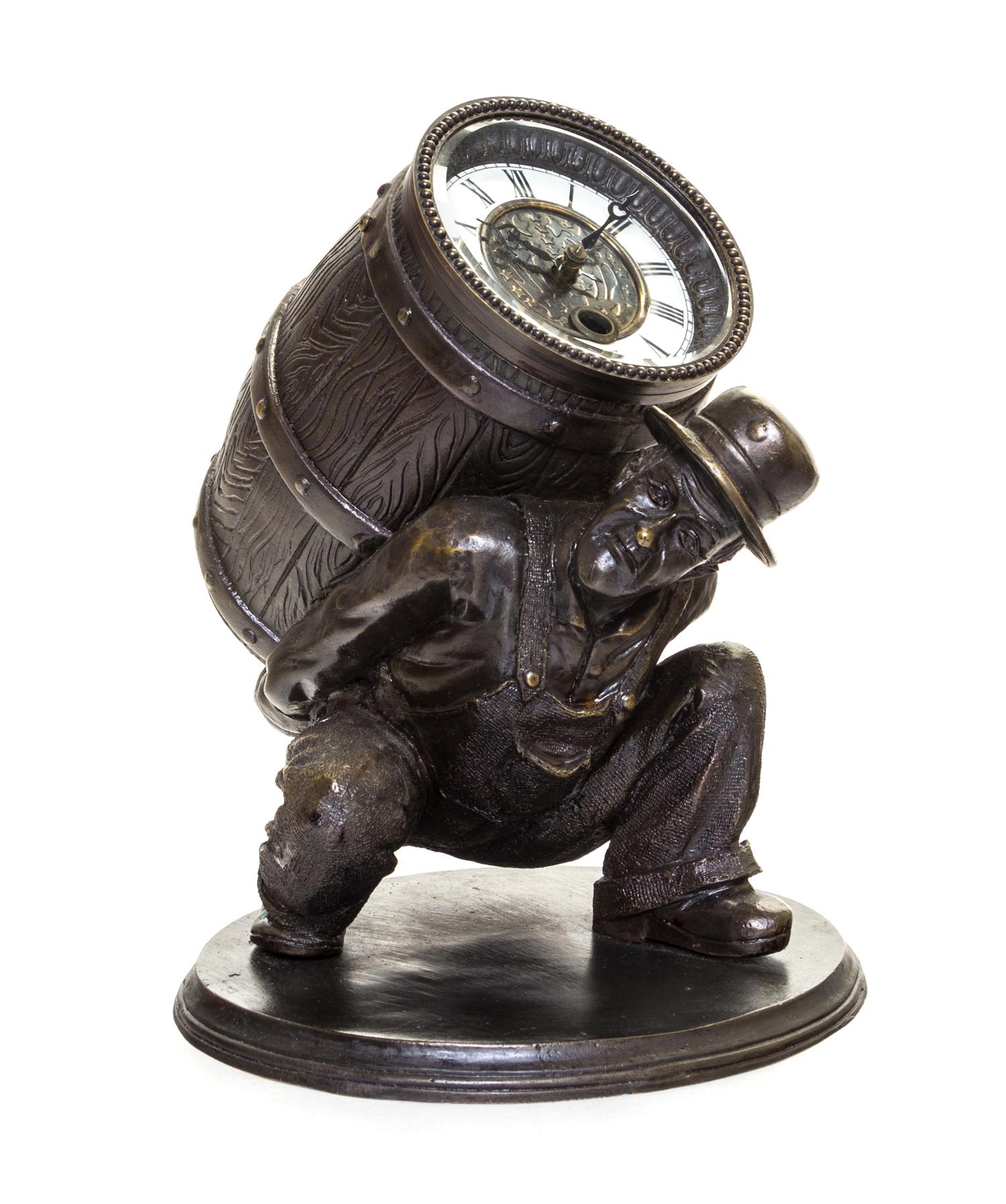 A Patinated Cast Metal Figural Clock Height 8 3/4 inches. — 19TH/20TH CENTURY