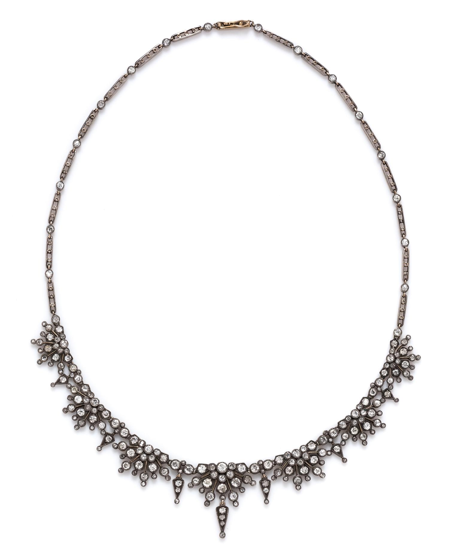 A Silver Topped Yellow Gold and Diamond Necklace,