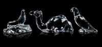 A Set of Three Baccarat Figures Length 7 inches.