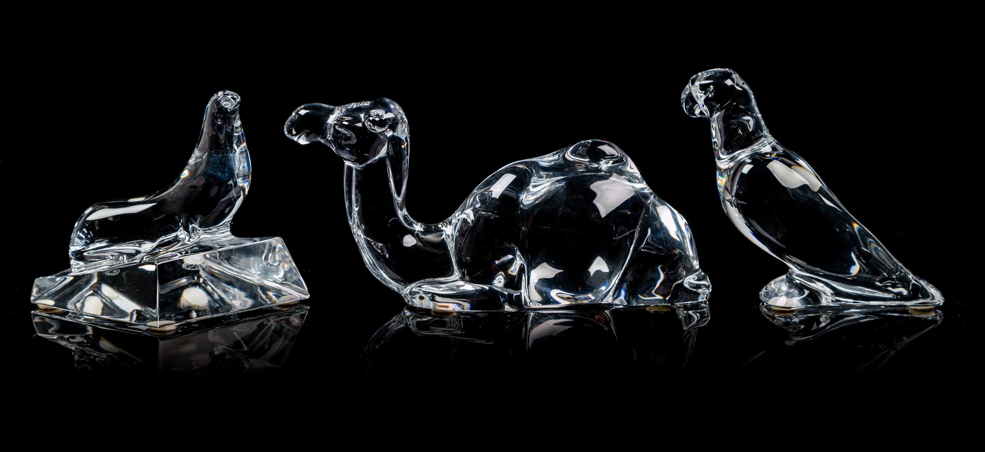 A Set of Three Baccarat Figures Length 7 inches.