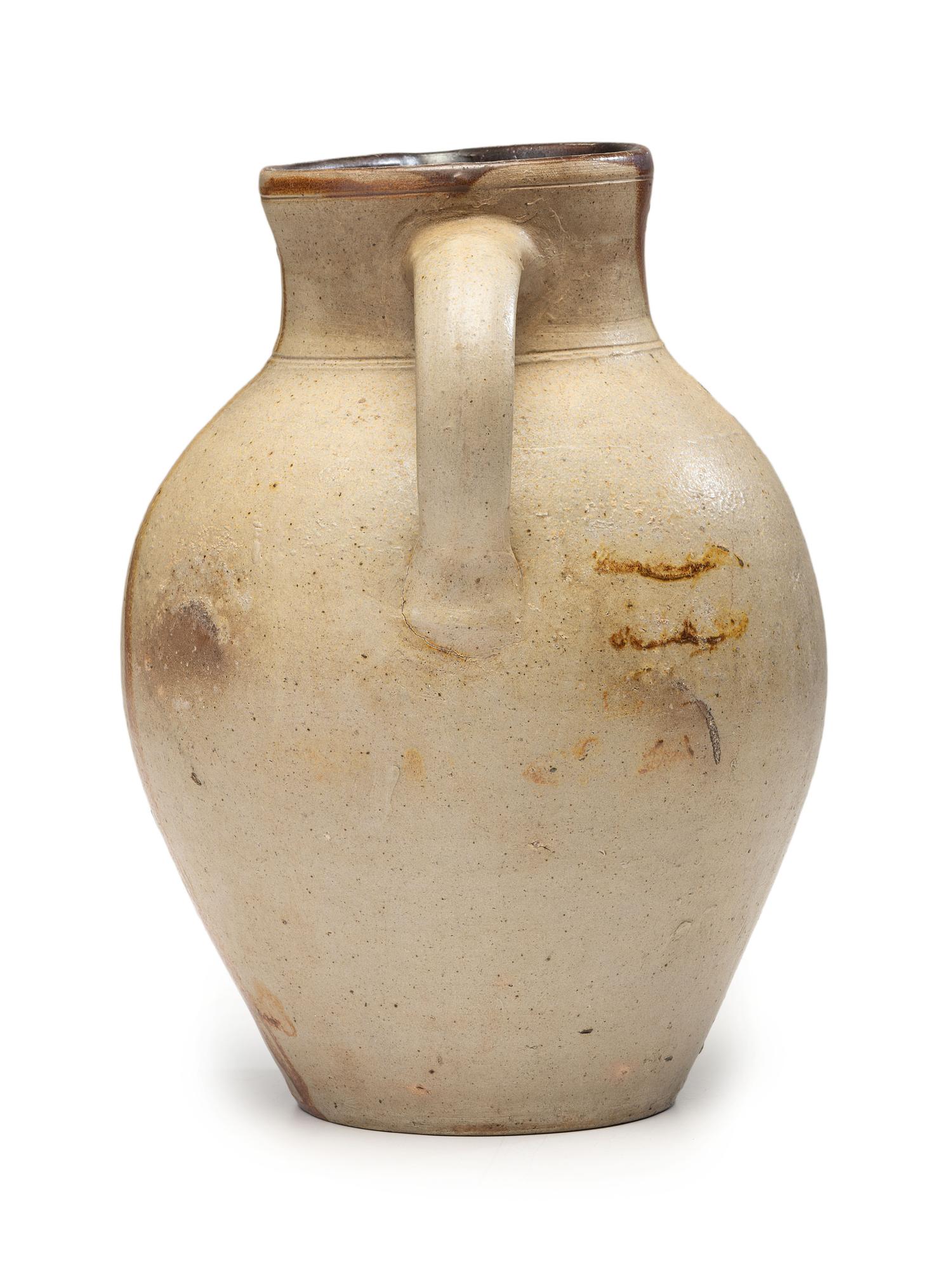 A Slip-Glazed Stoneware Pitcher