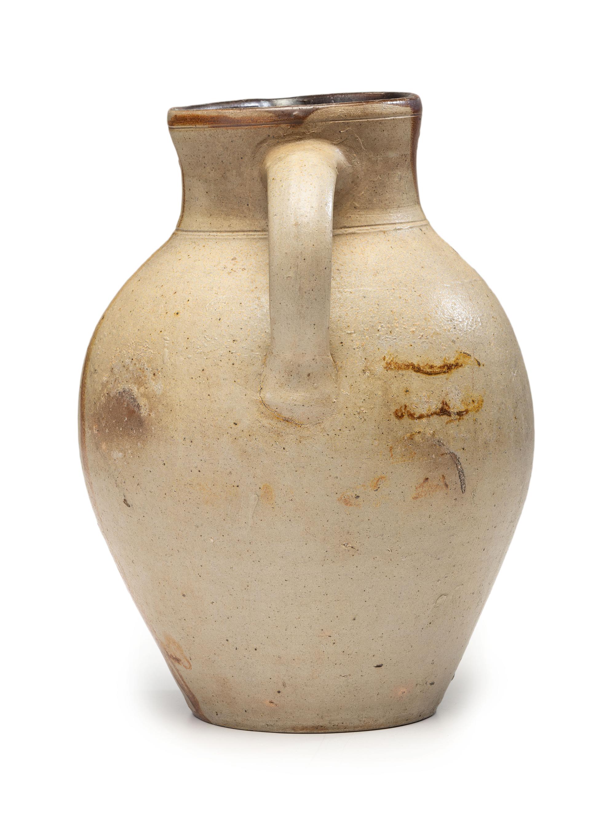 A Slip-Glazed Stoneware Pitcher