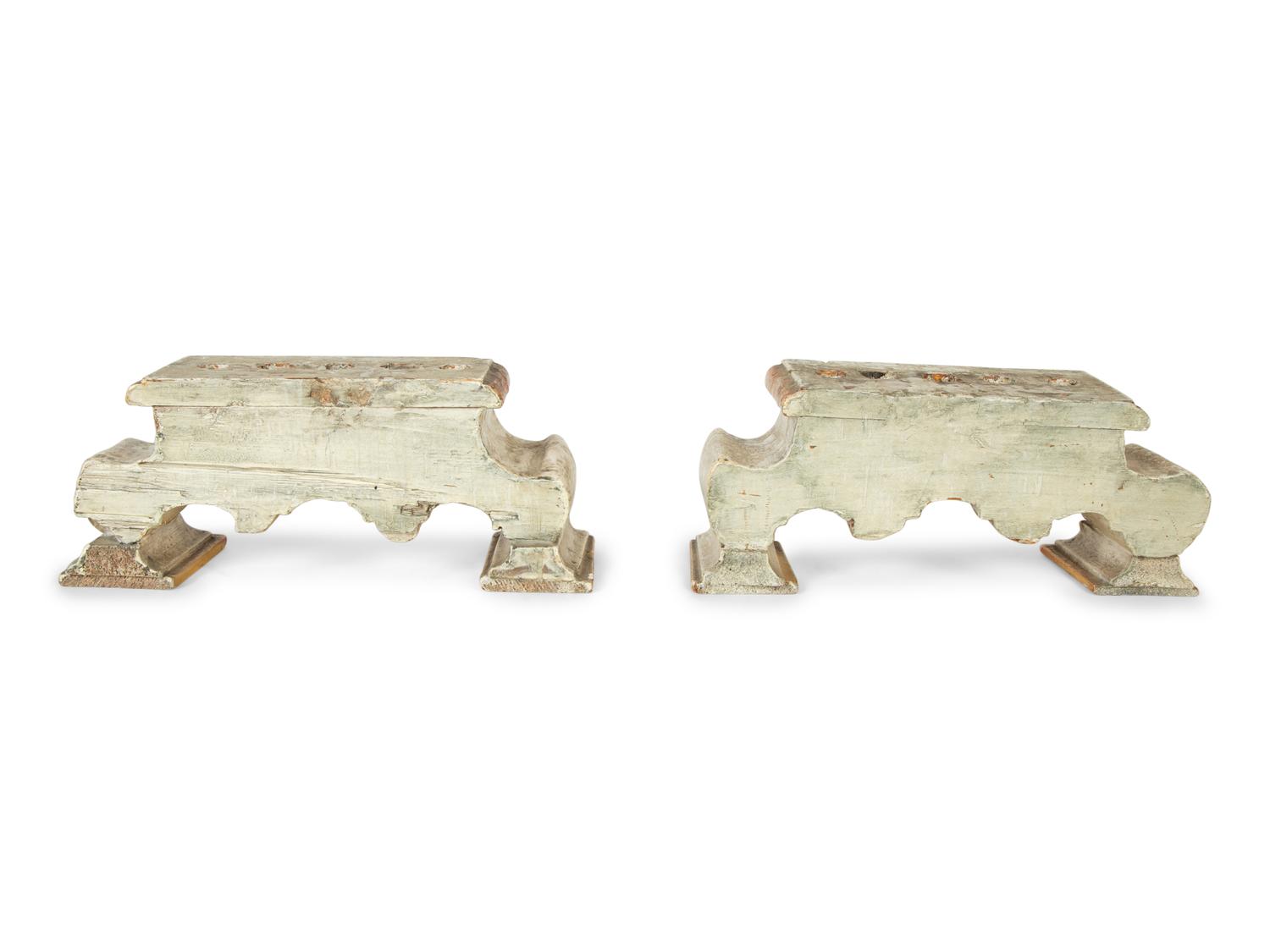 A Pair of Continental Painted and Parcel Gilt Candelabra