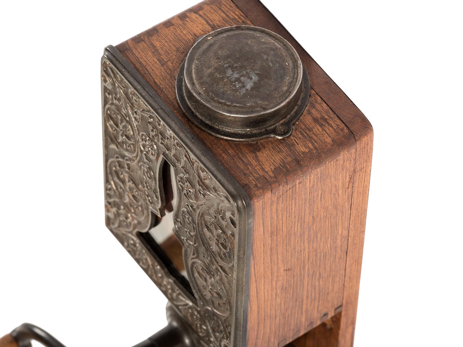 A Bell Cast Iron Wall Mount Coffee Grinder