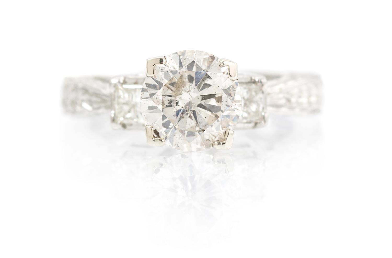 A Platinum and Diamond Ring, 6.30 dwts.
