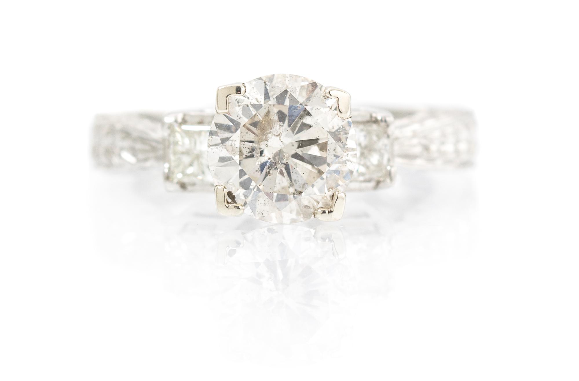 A Platinum and Diamond Ring, 6.30 dwts.