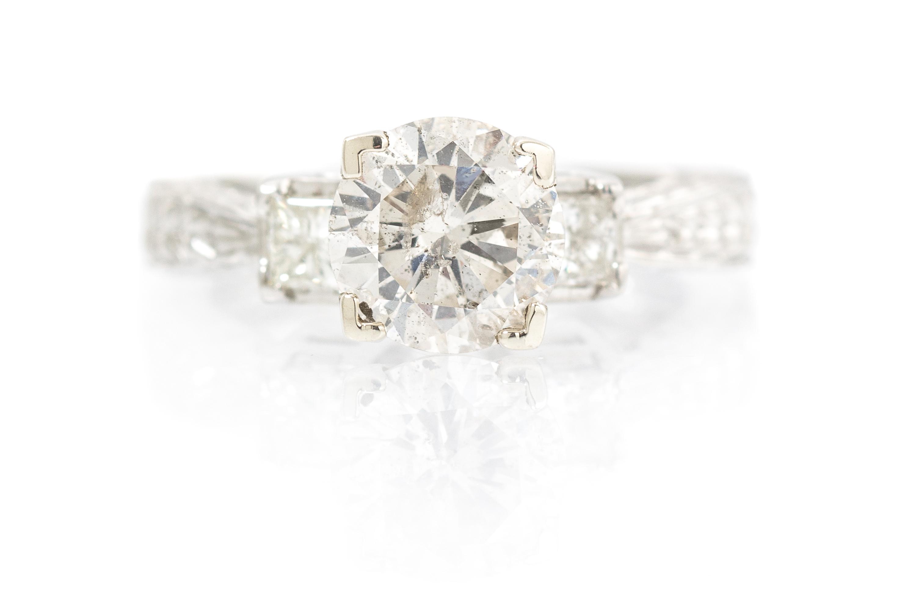 A Platinum and Diamond Ring, 6.30 dwts.
