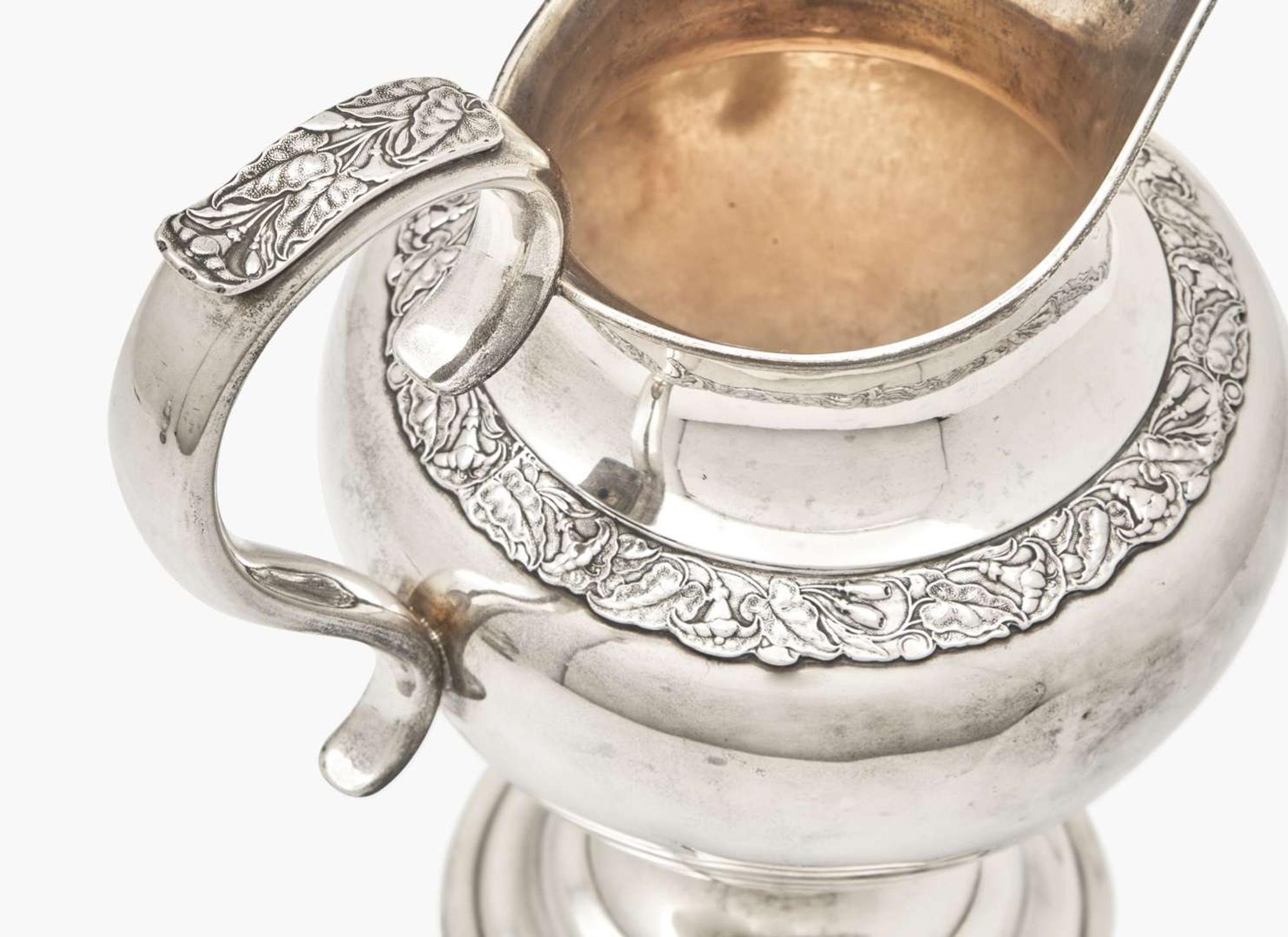 A Classical coin silver water pitcher and creamer, Davis, Palmer & Co. (active 1838-1845), Boston, MA, and John McMullin (1765-1843), Philadelphia, PA, circa 1820-1840