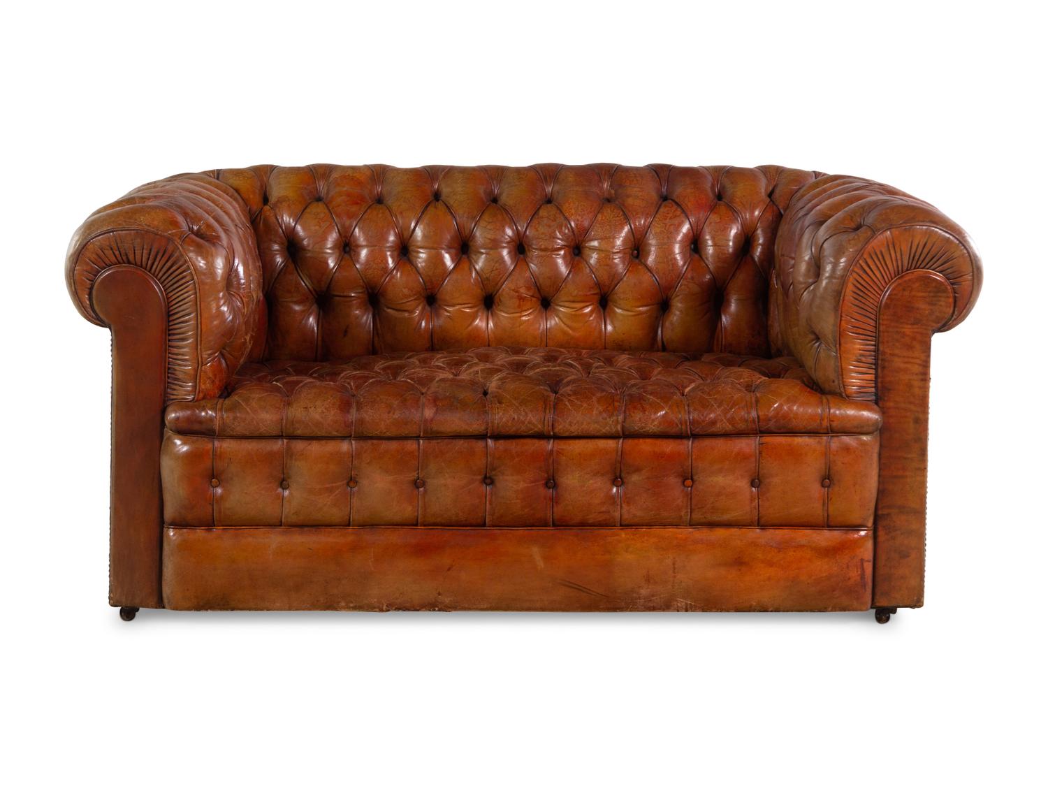 An English Leather Upholstered Chesterfield Sofa