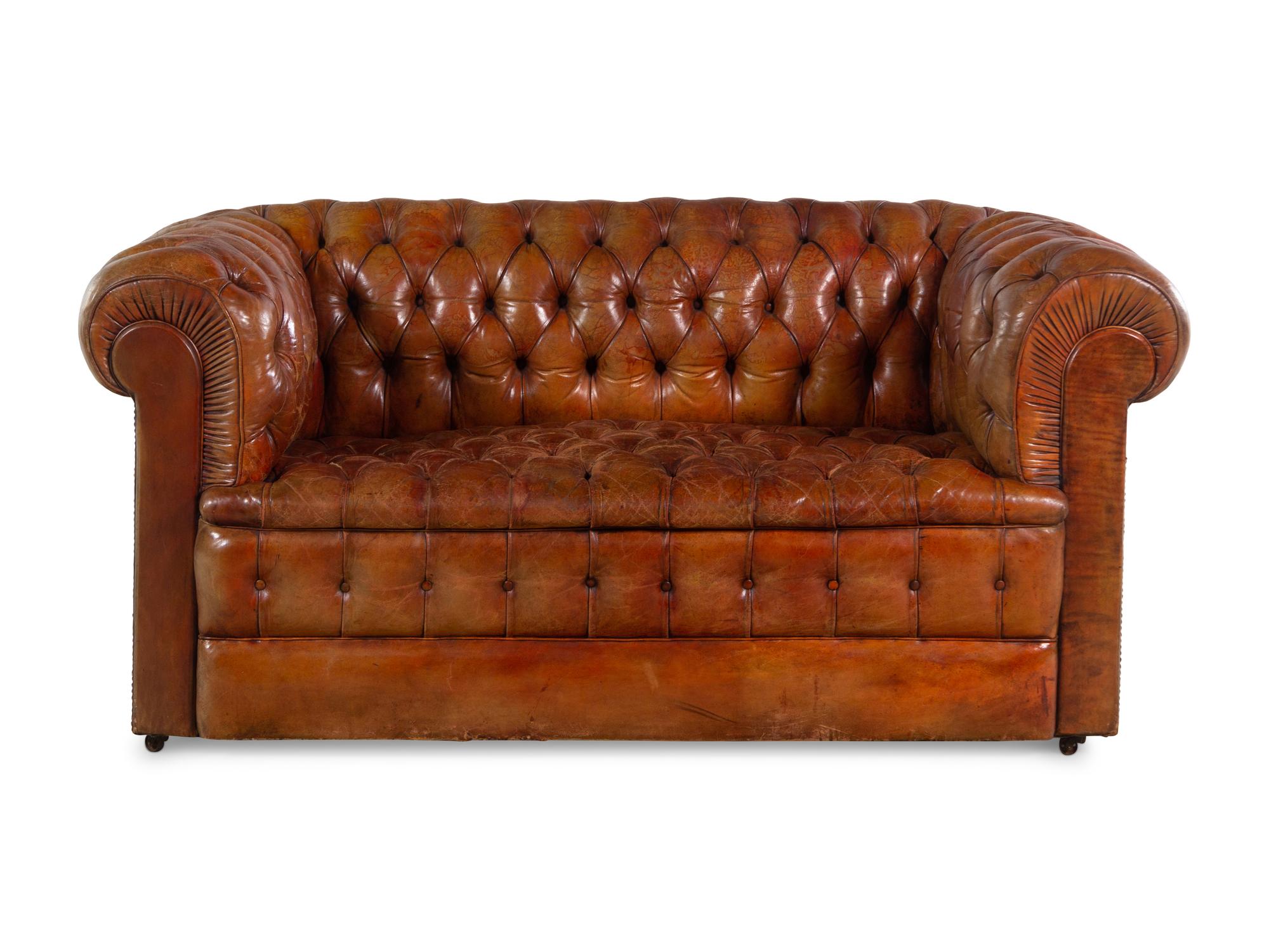 An English Leather Upholstered Chesterfield Sofa