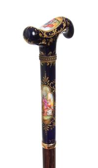 A Sevres Style Porcelain Handled Cane, Length of handle 6 x length overall 36 inches.