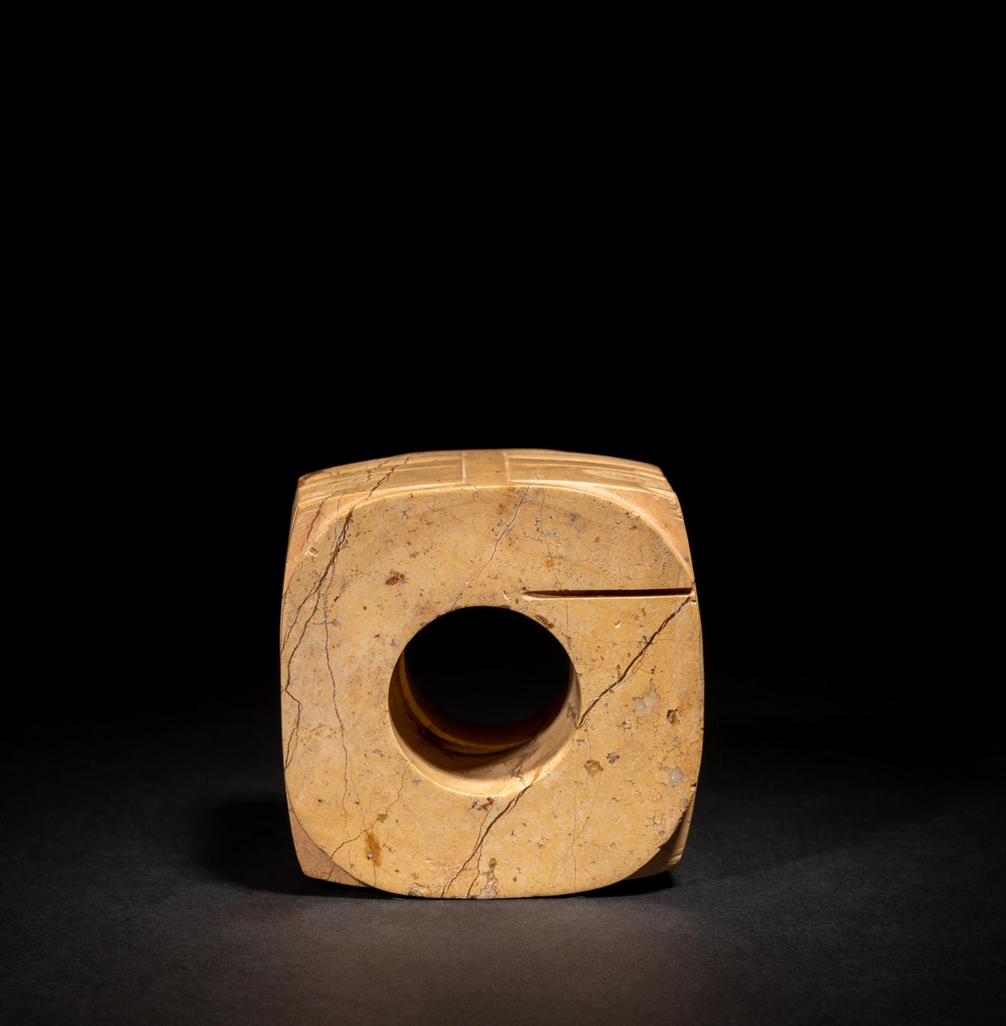 A Chinese Archaistic Chicken Bone Jade Cong