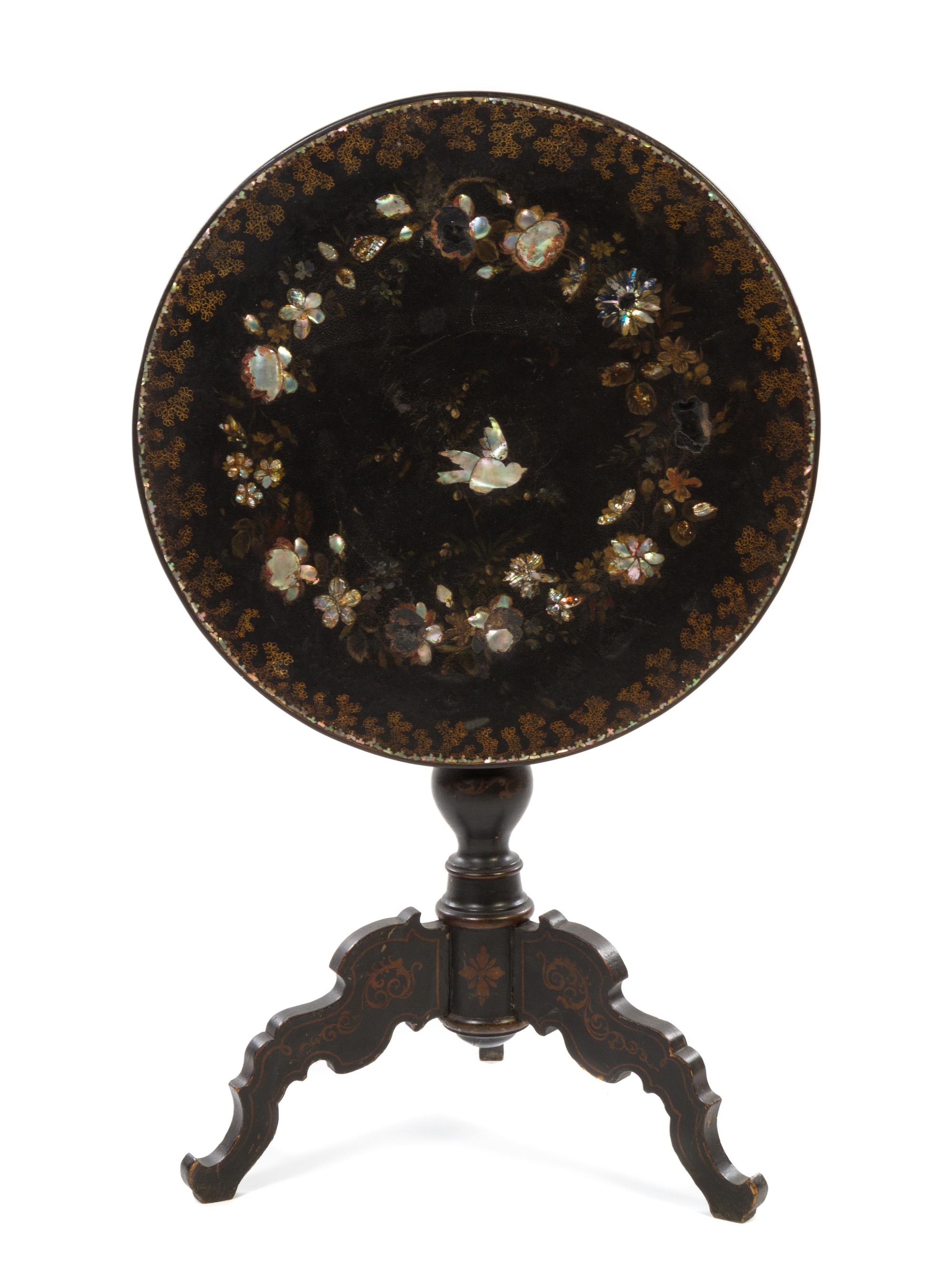 A Victorian Mother-of-Pearl Inset Lacquered Table Height 26 x diameter 24 inches. — 19TH CENTURY