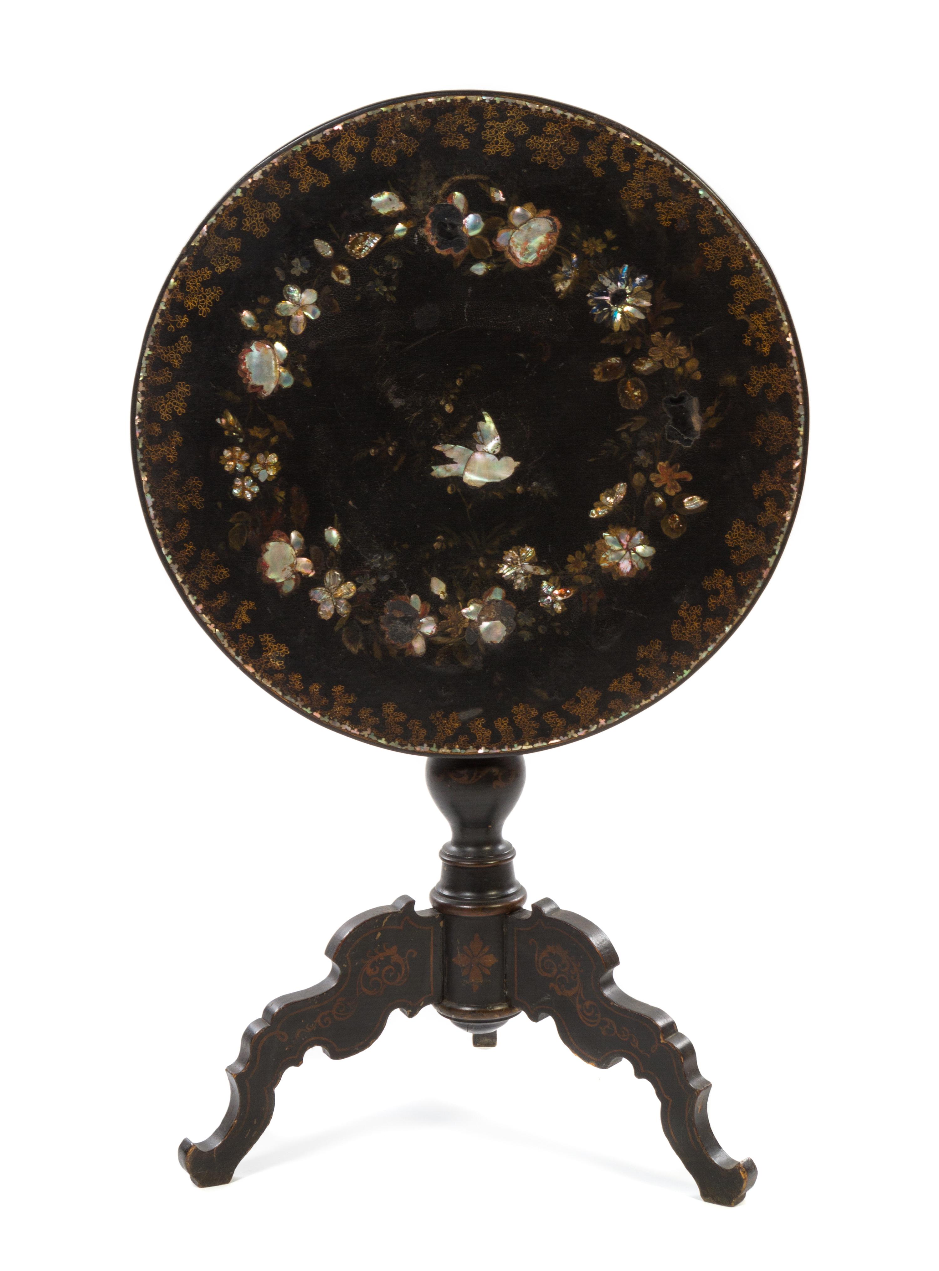 A Victorian Mother-of-Pearl Inset Lacquered Table Height 26 x diameter 24 inches. — 19TH CENTURY