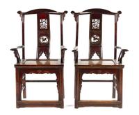 A Pair of Black Lacquered Elmwood Yoke-Back Armchairs MING STYLE Height of pair 45 3/4 inches. — MING STYLE