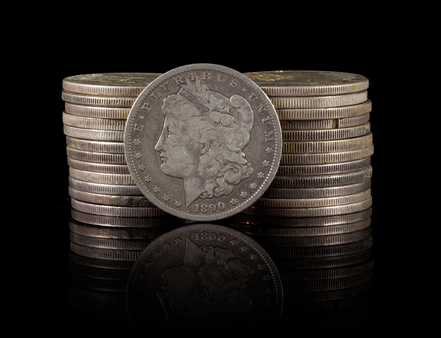 A Collection of United States Morgan and Peace Silver Dollars